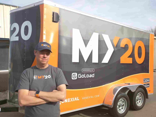 CEO of My20 app in front of trailer